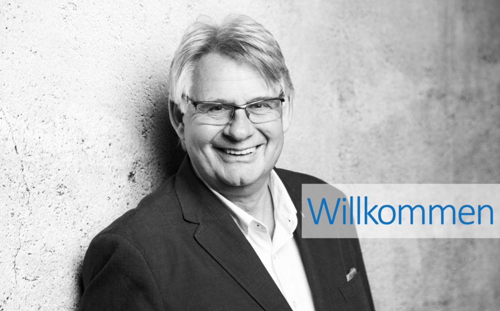 Das Bild zeigt ein Portrait von Hans-Georg Lampson.